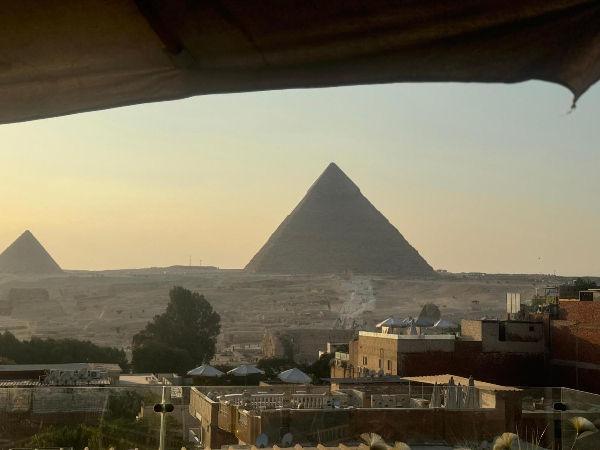 Pyramids And Sphinx View Cairo