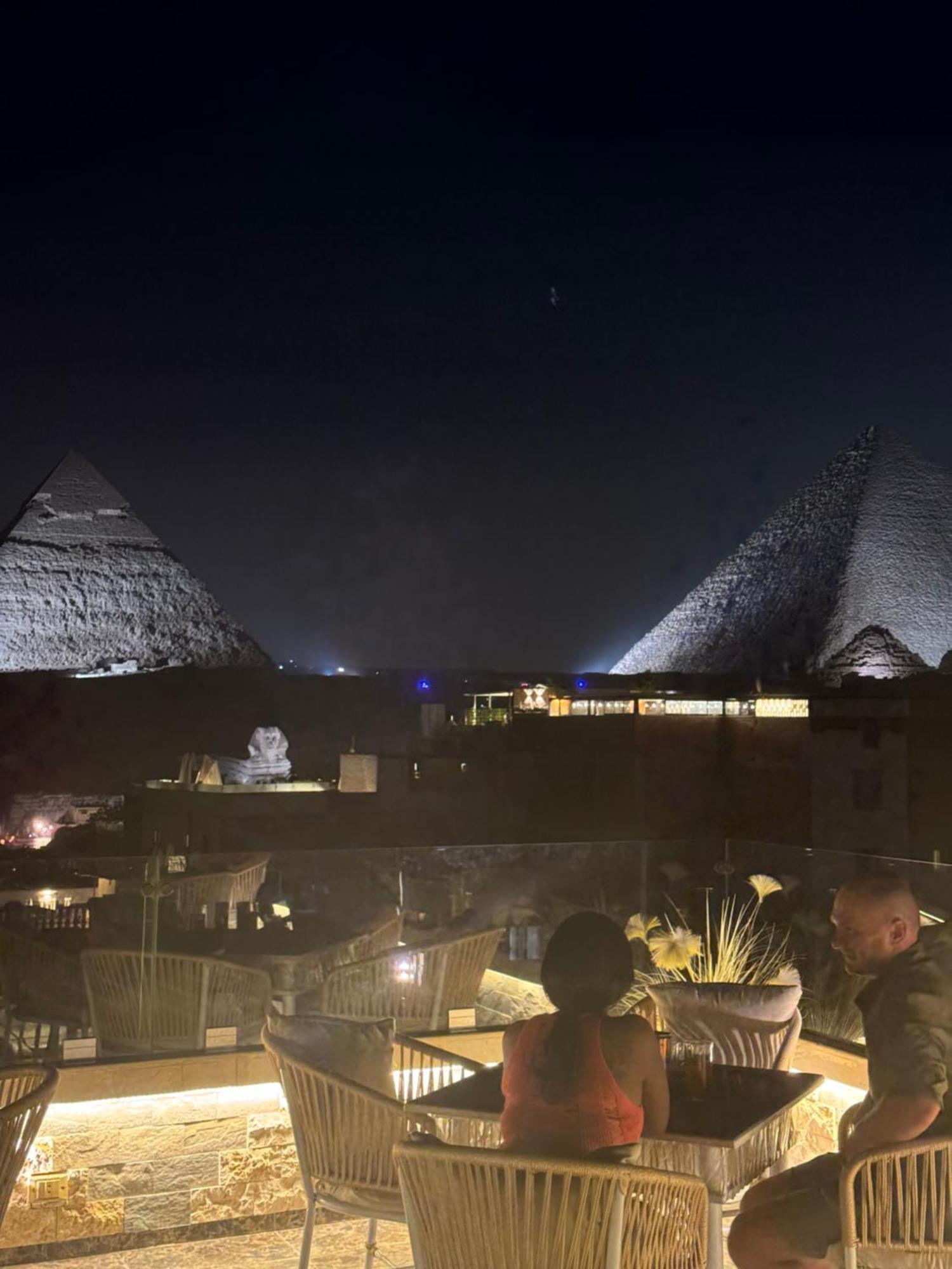 Pyramids And Sphinx View
