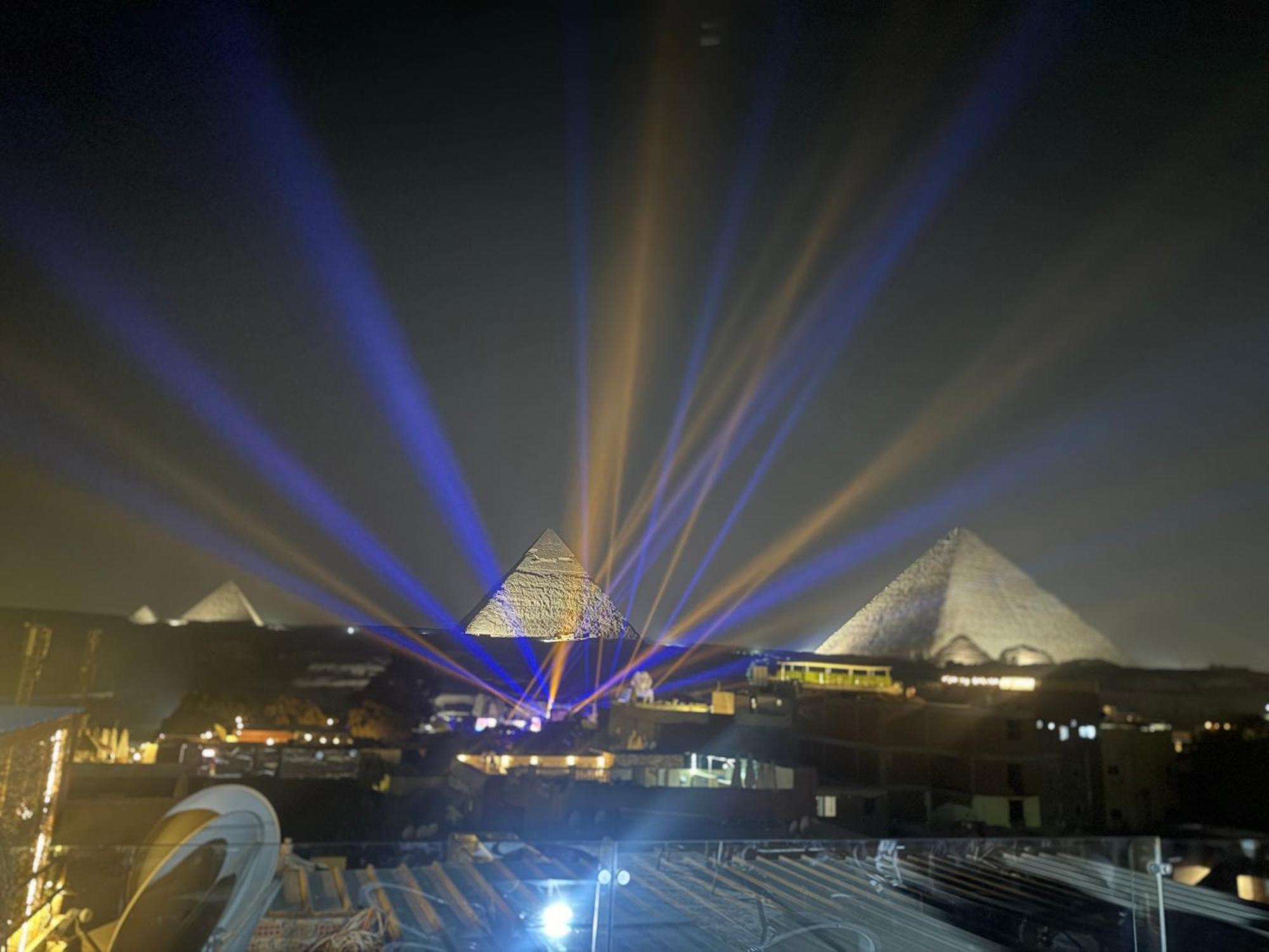 Pyramids And Sphinx View